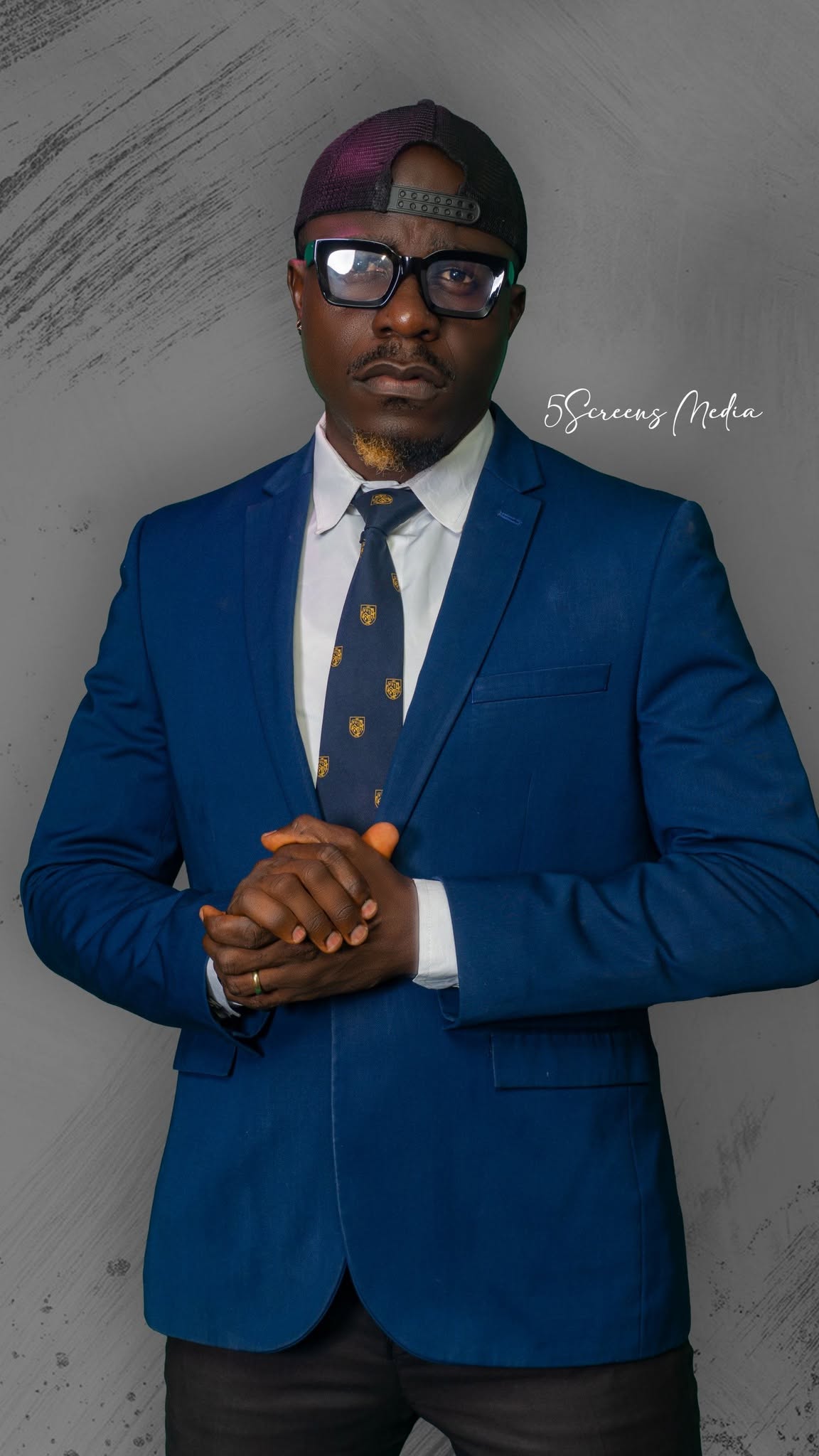 Edafe Dmouthpiece, Nigerian OAP and comedian, studio portrait